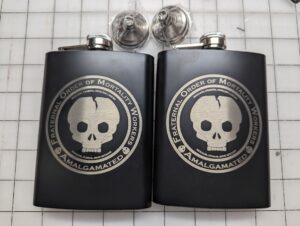 Flasks with skull design laser engraved.