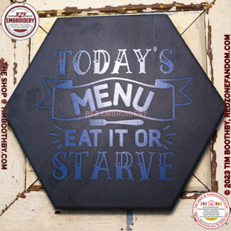 Tile with words Eat it or Starve