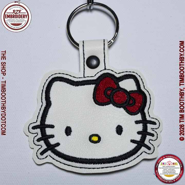 White cat key chain with bow